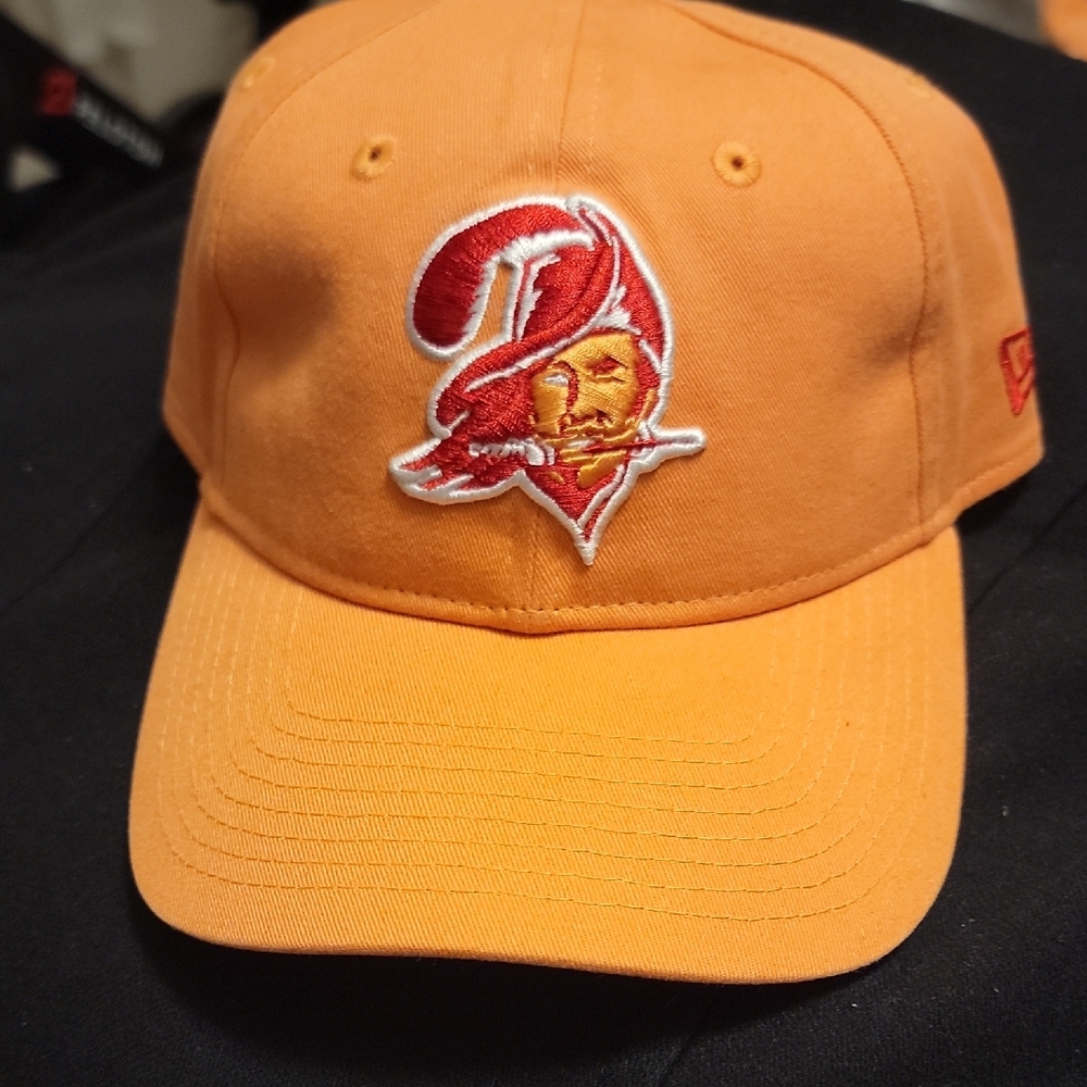 Tampa Bay Bucaneers New Era Orange Baseball Cap with Embroidered Logo.